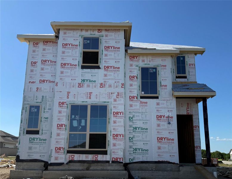 In-progress construction of a new home in Flora, Hutto, TX (Image 4).