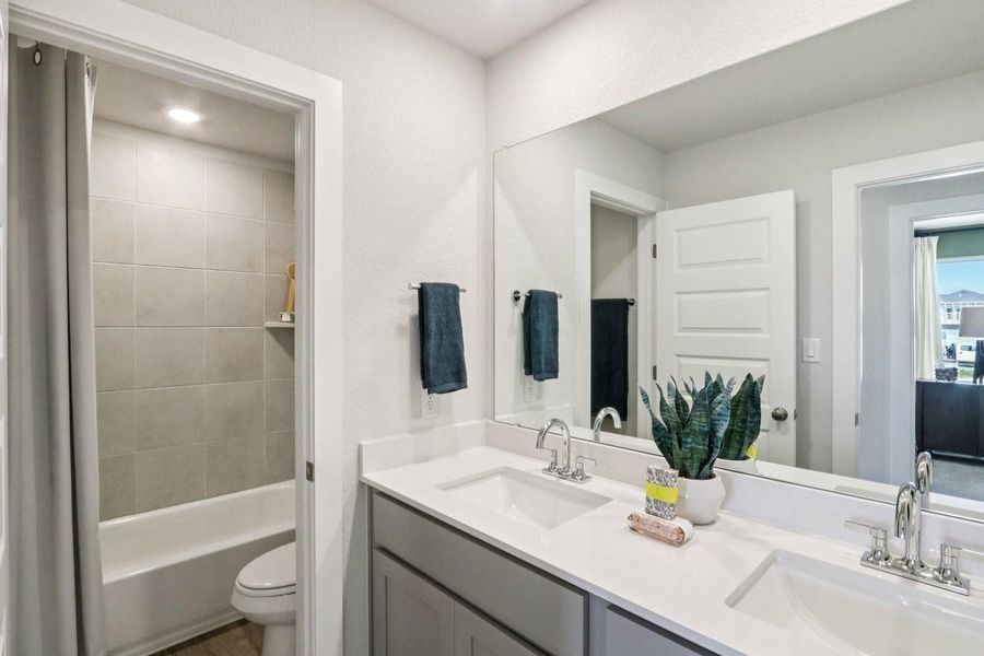 Furnished interior view inside a new home in Stallion Run, Buda (Image 6).