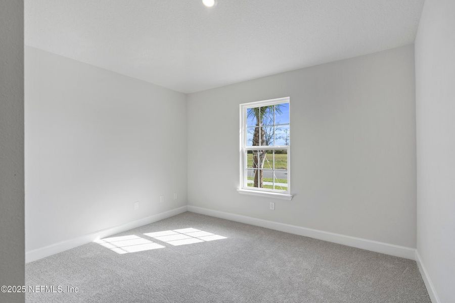 Spacious, unfurnished interior of a new home in Shadow Crest at Rolling Hills, Green Cove Springs (Image 16).
