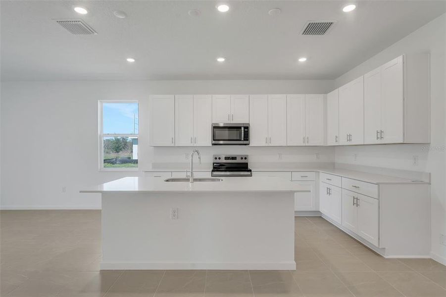 Furnished interior view inside a new home in Willowbrook North, Winter Haven (Image 14).