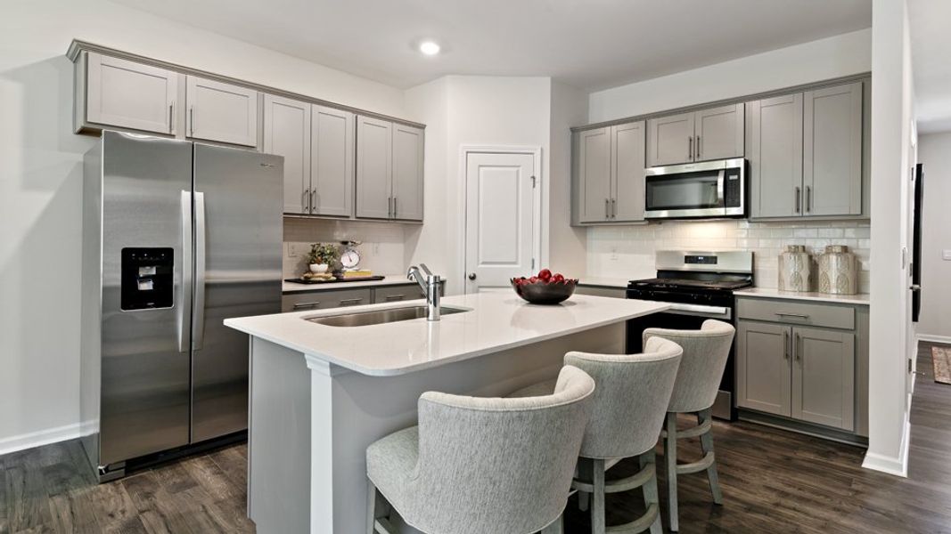 Representative furnished interior of a home built from the DENVER - TRADITIONS by D.R. Horton in Chapel Townes, Raleigh (Image 7).