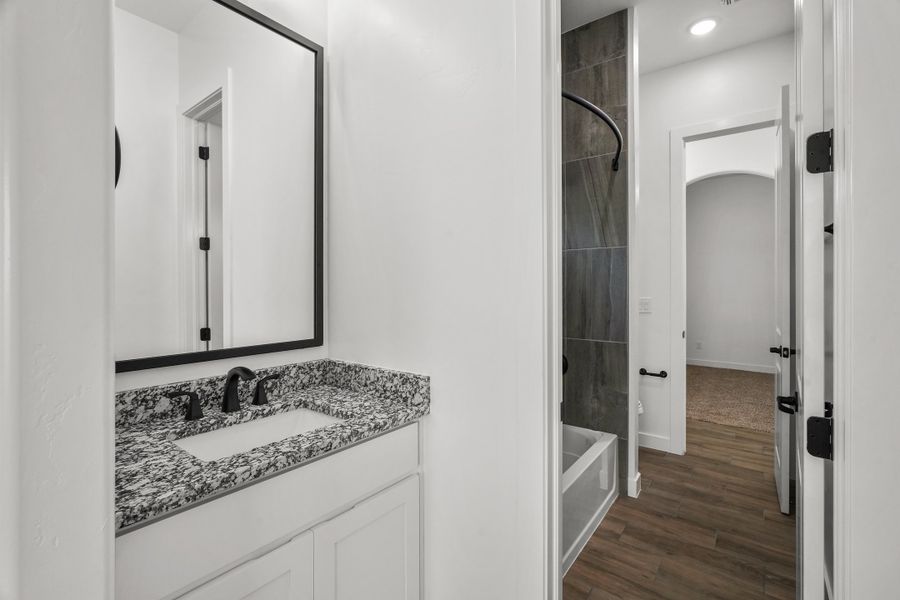 Representative furnished interior of a home built from the Scottsdale by LEH. Homes in Verdancia, El Paso (Image 39).