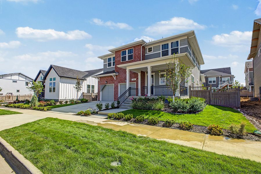Front exterior of a new home in Westerly, Erie, CO, highlighting curb appeal (Image 18).