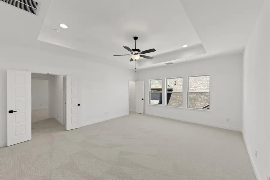 Representative unfurnished interior of a home built from the Newport by Windsor Homes in Nelson Lake Estates, Rockwall (Image 23).