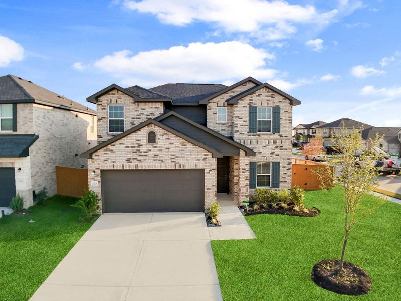 The front view of the home showcases its classic brick elevation, manicured landscaping, and welcoming driveway. This picture-perfect curb appeal makes a wonderful first impression in a beautifully maintained neighborhood. The front view of the home showcases its classic brick elevation, manicured landscaping, and welcoming driveway. This picture-perfect curb appeal makes a wonderful first impression in a beautifully maintained neighborhood.