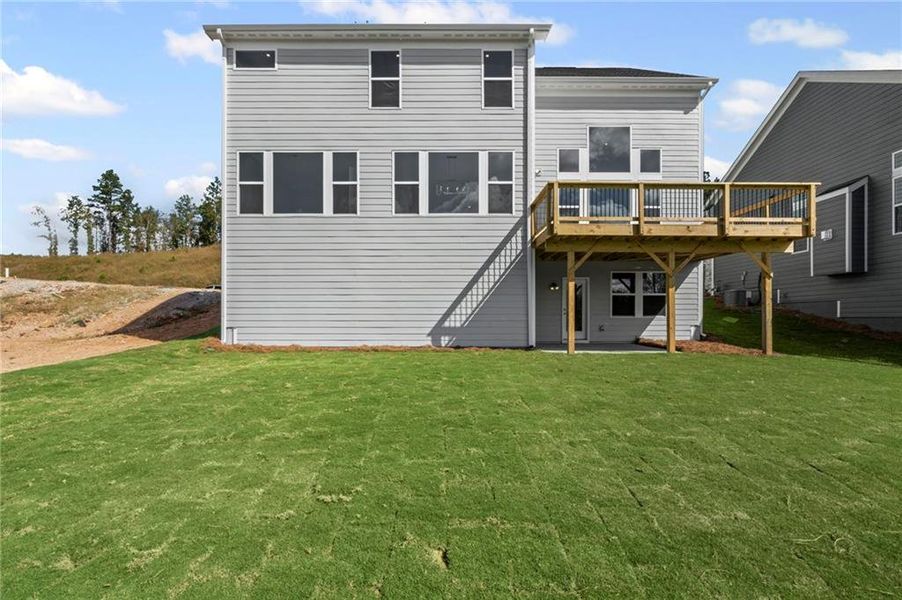 Exterior details and patio area of a home in Twin Lakes, Hoschton (Image 3).