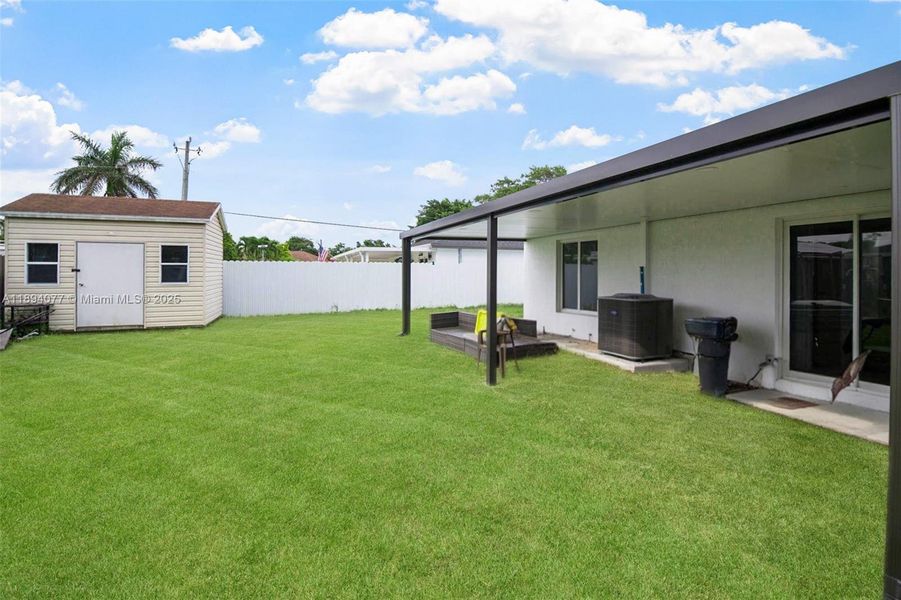 Exterior details and patio area of a home in , Miami (Image 1).