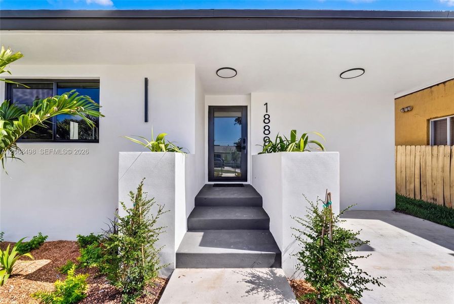 Exterior details and patio area of a home in , Miami (Image 1). Exterior details and patio area of a home in , Miami (Image 1).