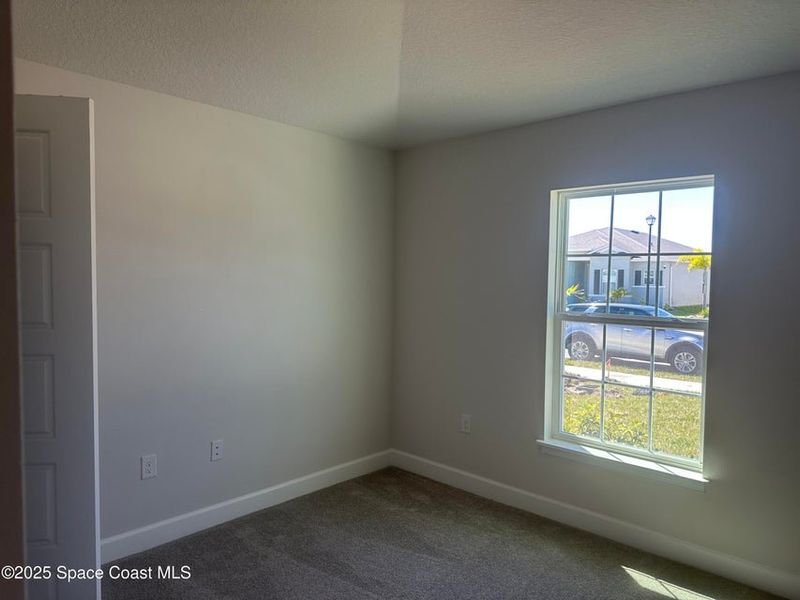 Spacious, unfurnished interior of a new home in St. John Preserve, Palm Bay (Image 11). Spacious, unfurnished interior of a new home in St. John Preserve, Palm Bay (Image 11).