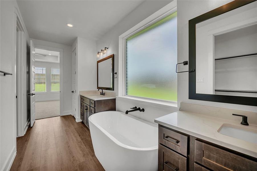 Please Note: These interior photos are not of the actual home but are of a completed one with a similar floor plan. Finishes, features, and layouts may vary.