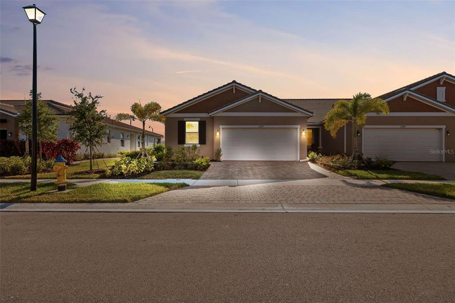 Front exterior of a new home in , Venice, FL, highlighting curb appeal (Image 2).
