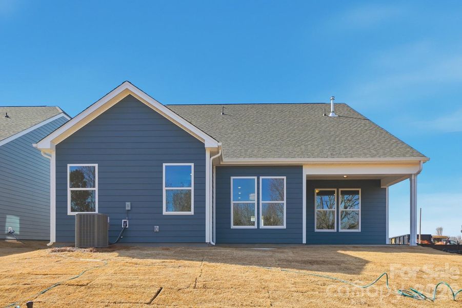 Exterior details and patio area of a home in Founders Landing | 55+ Community, Gastonia (Image 22).
