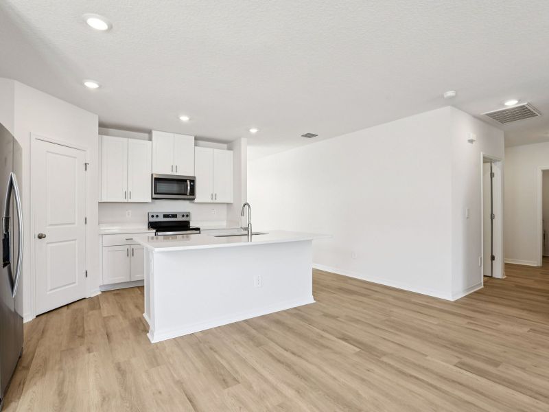 Furnished interior view inside a new home in Benton Hills - Classic Series, Brooksville (Image 5). Furnished interior view inside a new home in Benton Hills - Classic Series, Brooksville (Image 5).