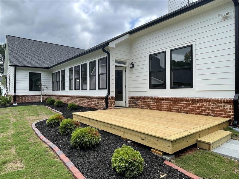 Front exterior of a new home in , Monroe, GA, highlighting curb appeal (Image 2).