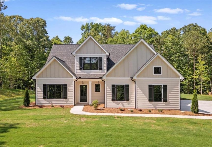 Front exterior of a new home in , Carrollton, GA, highlighting curb appeal (Image 2).