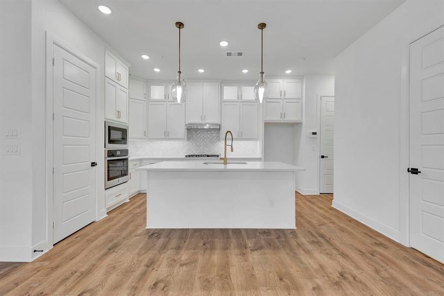 Furnished interior view inside a new home in Hillside at Las Colinas, Irving (Image 8). Furnished interior view inside a new home in Hillside at Las Colinas, Irving (Image 8).
