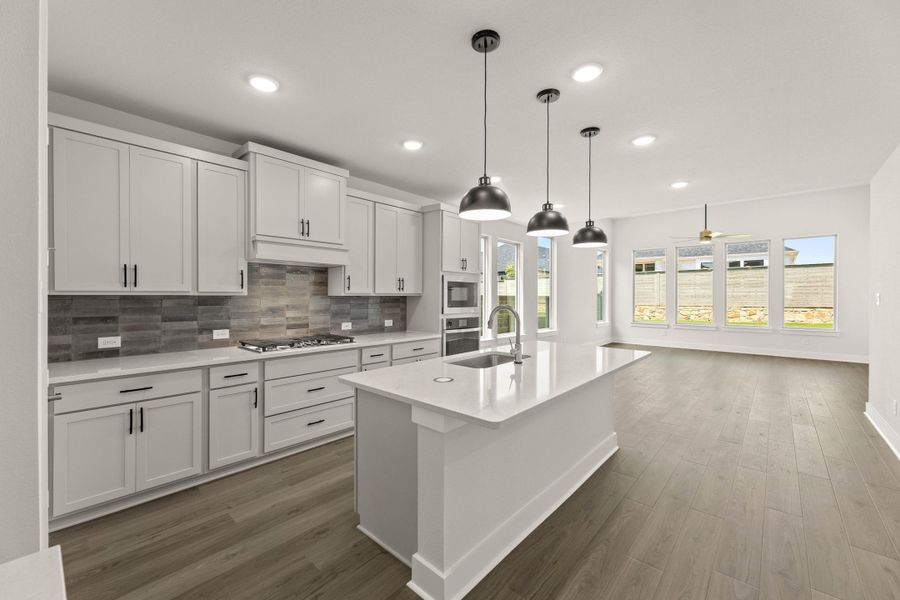 Representative furnished interior of a home built from the Willow by Tri Pointe Homes in Treeline, Justin (Image 6).