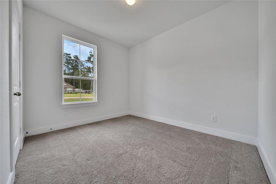 Spacious, unfurnished interior of a new home in Roman Forest, New Caney (Image 28).
