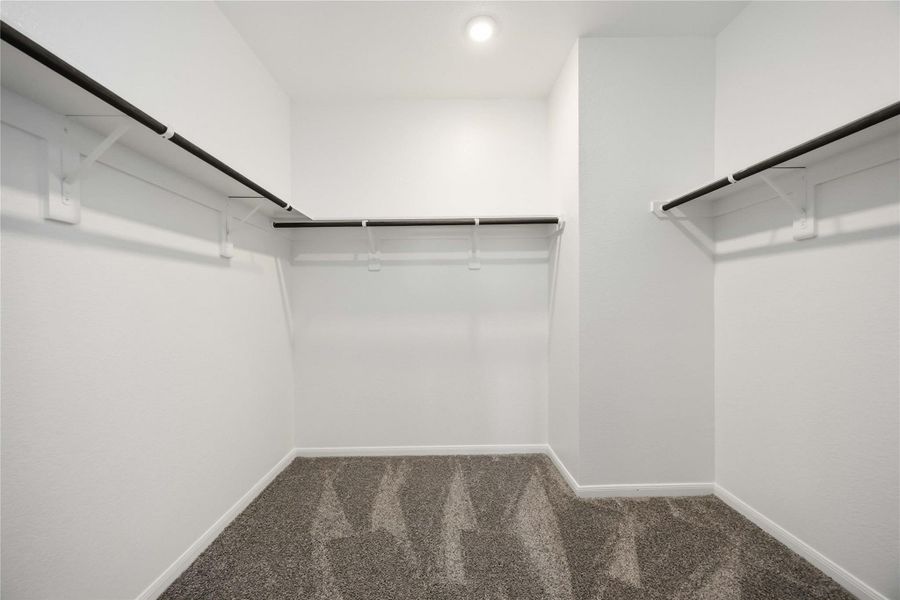 Spacious, unfurnished interior of a new home in Sunterra, Katy (Image 31).