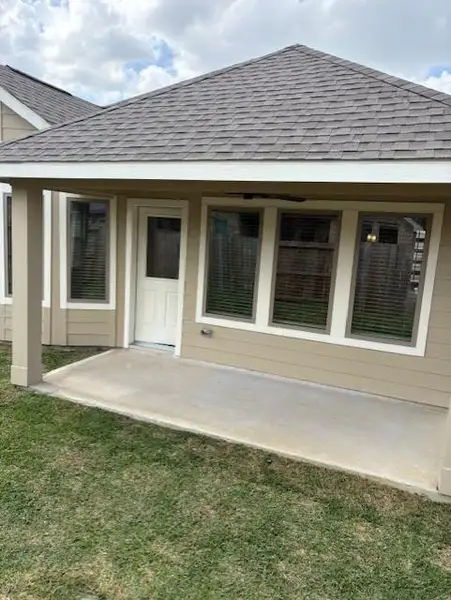 Exterior details and patio area of a home in , Spring (Image 4).
