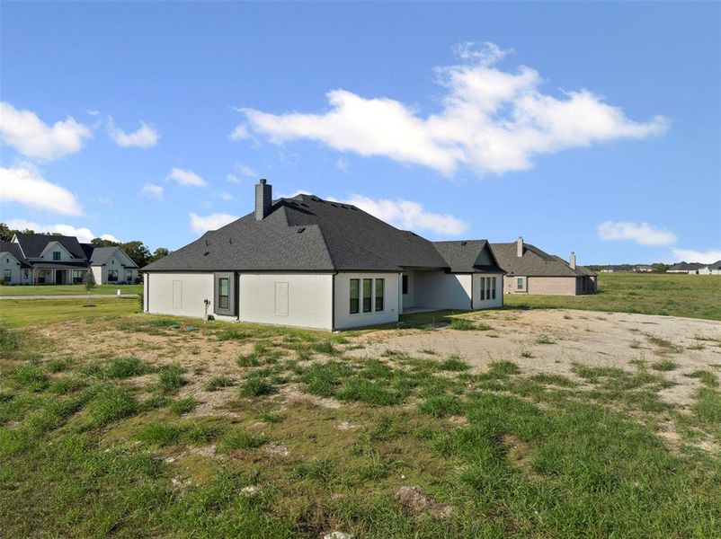 Exterior details and patio area of a home in Tuscan Estates (1 Acre Lots), Waxahachie (Image 2). Exterior details and patio area of a home in Tuscan Estates (1 Acre Lots), Waxahachie (Image 2).