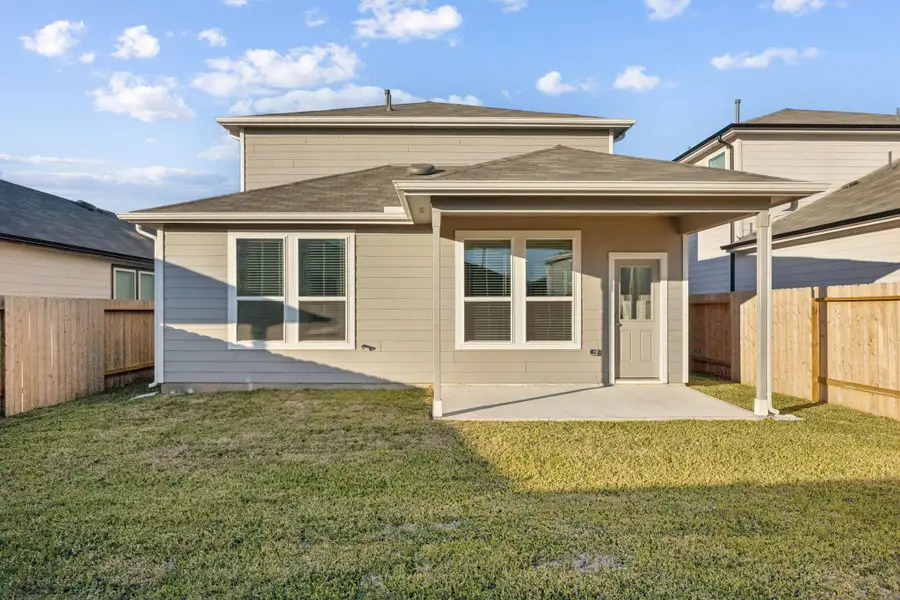 Exterior details and patio area of a home in Decker Farms, Magnolia (Image 3).