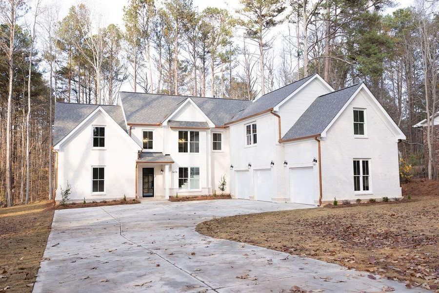 Front exterior of a new home in , Atlanta, GA, highlighting curb appeal (Image 2).