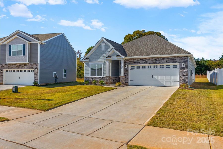 Front exterior of a new home in Fergus Crossing, York, SC, highlighting curb appeal (Image 2). Front exterior of a new home in Fergus Crossing, York, SC, highlighting curb appeal (Image 2).