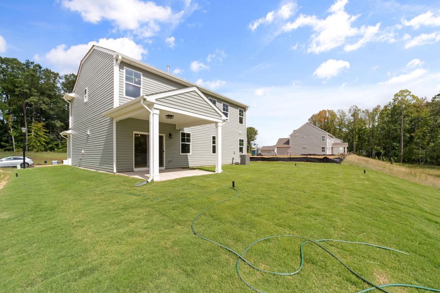 Exterior details and patio area of a home in Chandler Ridge, McLeansville (Image 3).