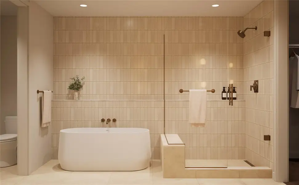 Primary bathroom in the Tranquil palette, featuring a walk-in shower, freestanding tub, tiled walls, limestone flooring, and recessed lighting. A serene, spa-inspired retreat designed to promote relaxation and comfort. Primary bathroom in the Tranquil palette, featuring a walk-in shower, freestanding tub, tiled walls, limestone flooring, and recessed lighting. A serene, spa-inspired retreat designed to promote relaxation and comfort.