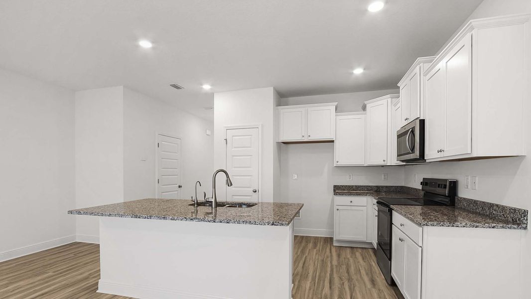 Furnished interior view inside a new home in Hawks Landing Townhomes, Santa Rosa Beach (Image 5).