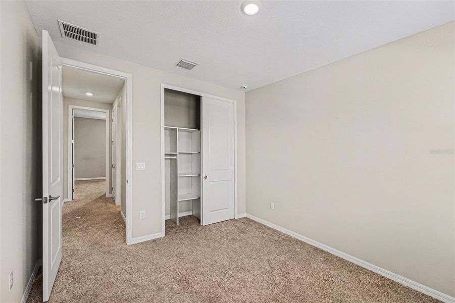 Spacious, unfurnished interior of a new home in Eave's Bend at Artisan Lakes, Palmetto (Image 18).