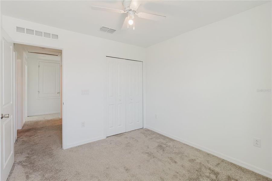 Spacious, unfurnished interior of a new home in Peace Creek Reserve, Winter Haven (Image 26). Spacious, unfurnished interior of a new home in Peace Creek Reserve, Winter Haven (Image 26).