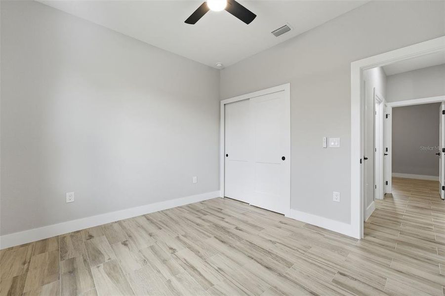 Spacious, unfurnished interior of a new home in , Port Charlotte (Image 28).