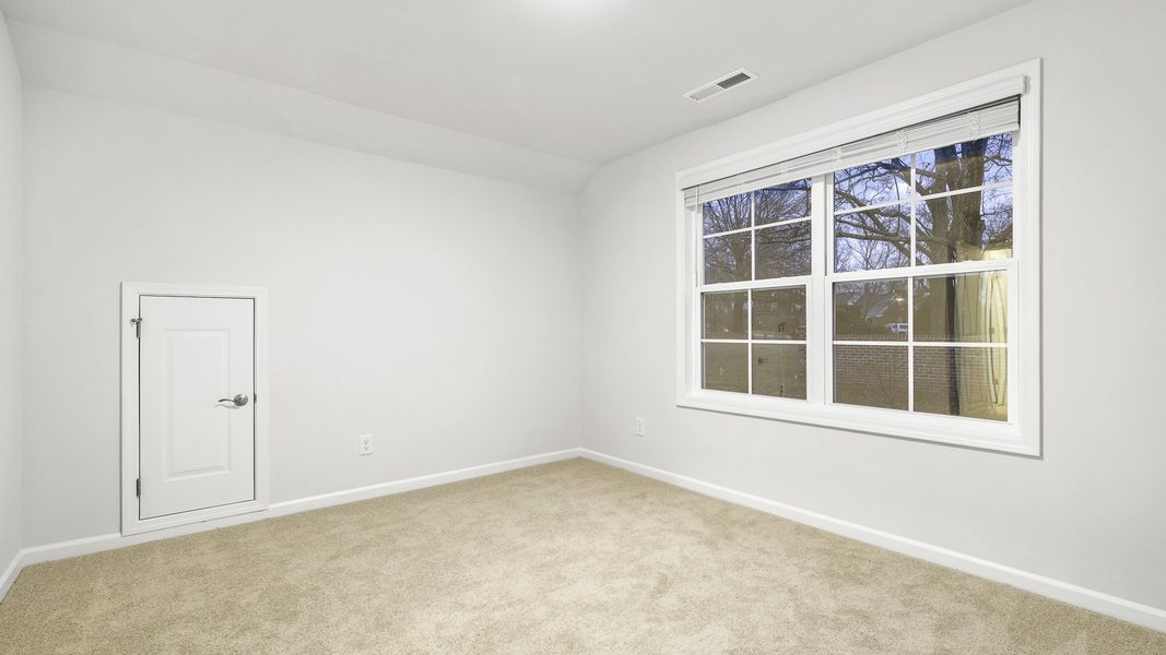 Spacious, unfurnished interior of a new home in The Villas at Kinsley, Jamestown (Image 10).