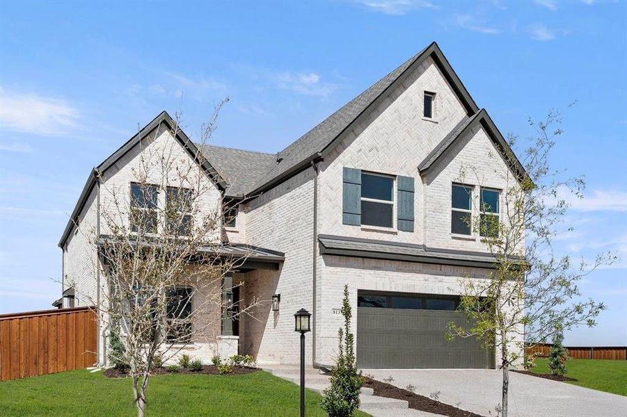 Front exterior of a new home in Inspiration, Lucas, TX, highlighting curb appeal (Image 24).