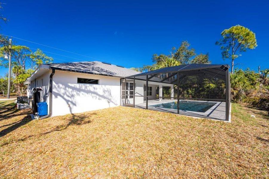 Exterior details and patio area of a home in , Port Charlotte (Image 19).
