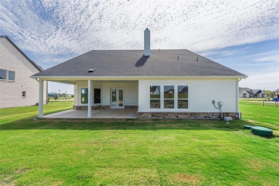 Exterior details and patio area of a home in Rocky Top, Krum (Image 2). Exterior details and patio area of a home in Rocky Top, Krum (Image 2).