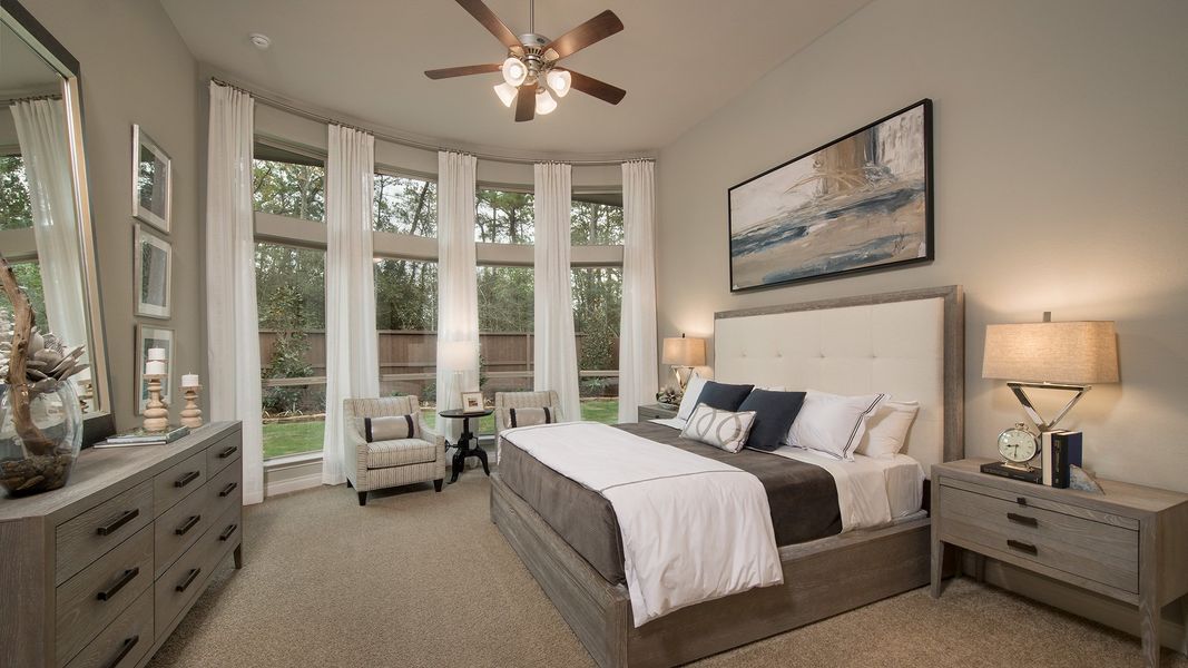 Representative furnished interior of a home built from the 3578W by Perry Homes in Lakes of Cane Island, Katy (Image 14).