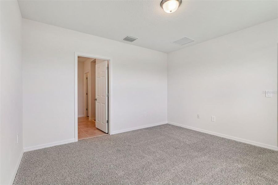 Spacious, unfurnished interior of a new home in Bradbury Creek - Classic Series, Haines City (Image 19).