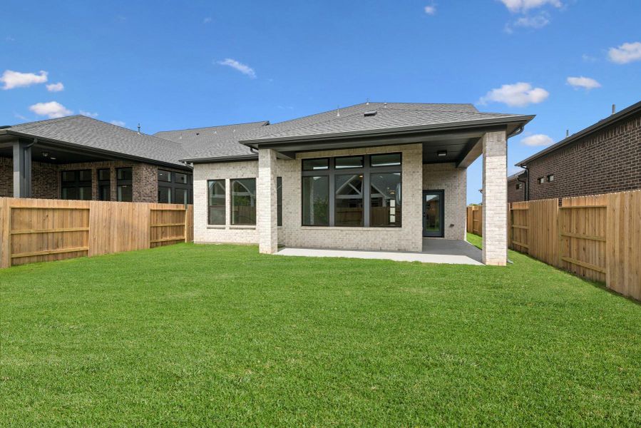 Front exterior of a new home in Grange 45' Homesites, Katy, TX, highlighting curb appeal (Image 24). Front exterior of a new home in Grange 45' Homesites, Katy, TX, highlighting curb appeal (Image 24).