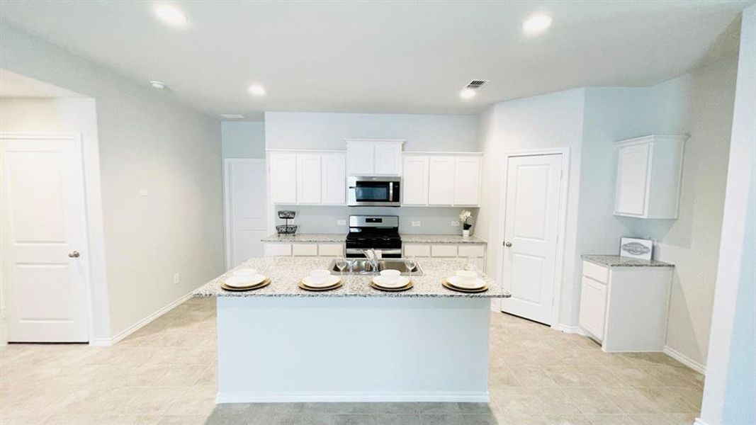 Kitchen - All Home and community information, including pricing, included features, terms, availability and amenities, are subject to change at any time without notice or obligation. All Drawings, pictures, photographs, video, square footages, floor plans, elevations, features, colors and sizes are approximate for illustration purposes only and will vary from the homes as built.