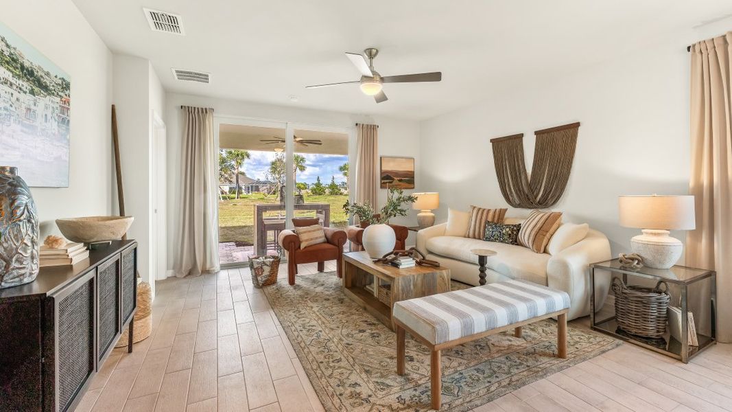 Representative furnished interior of a home built from the Carrington by D.R. Horton in Central Parc, North Port (Image 4).