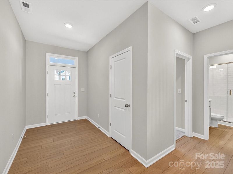 Spacious, unfurnished interior of a new home in North Creek Village - Townhomes, Huntersville (Image 24).