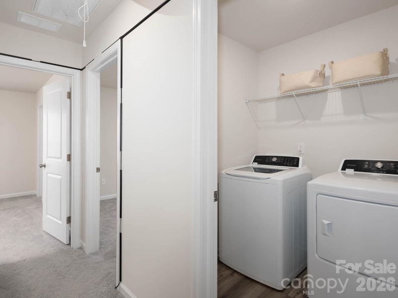 Laundry located upstairs for added convenience. Washer & Dryer convey with sale.