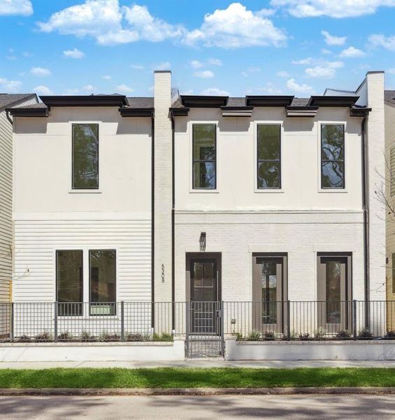 Exceptional Curb Appeal - This home comes with a well-proportioned handsome elevation. Elegant combination of hand slurred brick, painted carriage style garage door with a terracotta paver driveway.