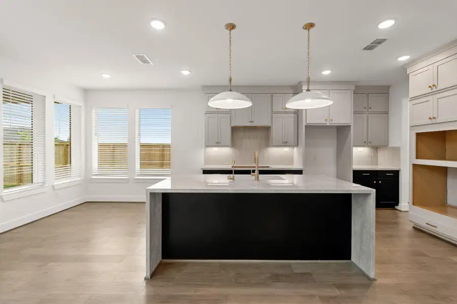 *REPRESENTATIVE PHOTO* Inviting Breakfast Area With Wraparound Windows Near The Open Kitchen *REPRESENTATIVE PHOTO* Inviting Breakfast Area With Wraparound Windows Near The Open Kitchen