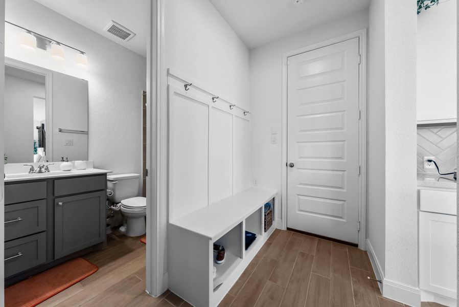 Mudroom featuring wood finish floors