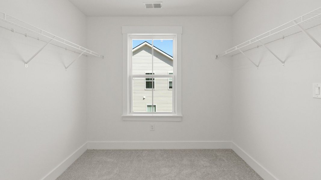 A generous walk-in closet provides storage for Bedroom 4.