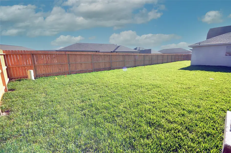Exterior details and patio area of a home in Pedregal, League City (Image 26).